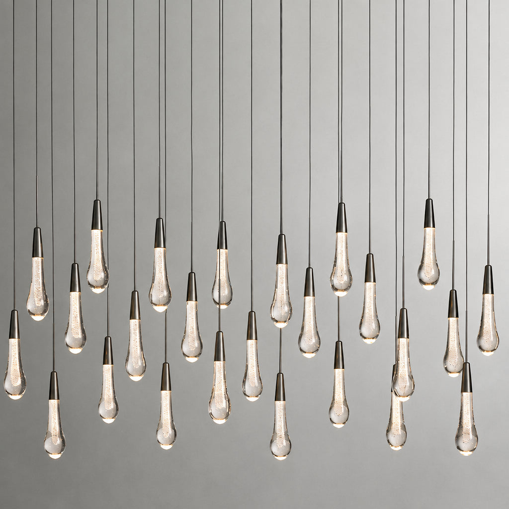 North America Arhaus Villa: Open-concept duplex staircase with long, understated luxury crystal living room lights and copper pendant lights