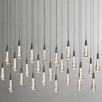 North America Arhaus Villa: Open-concept duplex staircase with long, understated luxury crystal living room lights and copper pendant lights