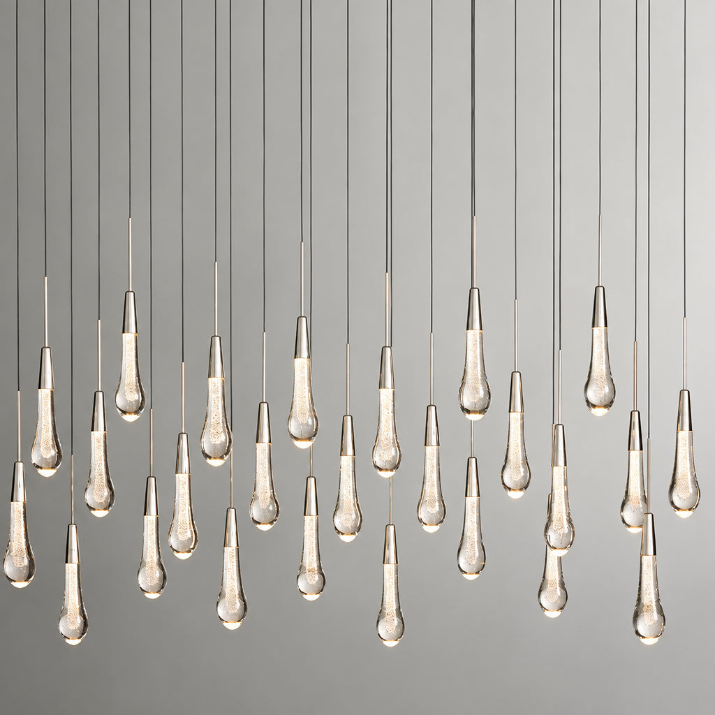 North America Arhaus Villa: Open-concept duplex staircase with long, understated luxury crystal living room lights and copper pendant lights
