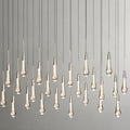 North America Arhaus Villa: Open-concept duplex staircase with long, understated luxury crystal living room lights and copper pendant lights