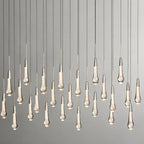 North America Arhaus Villa: Open-concept duplex staircase with long, understated luxury crystal living room lights and copper pendant lights