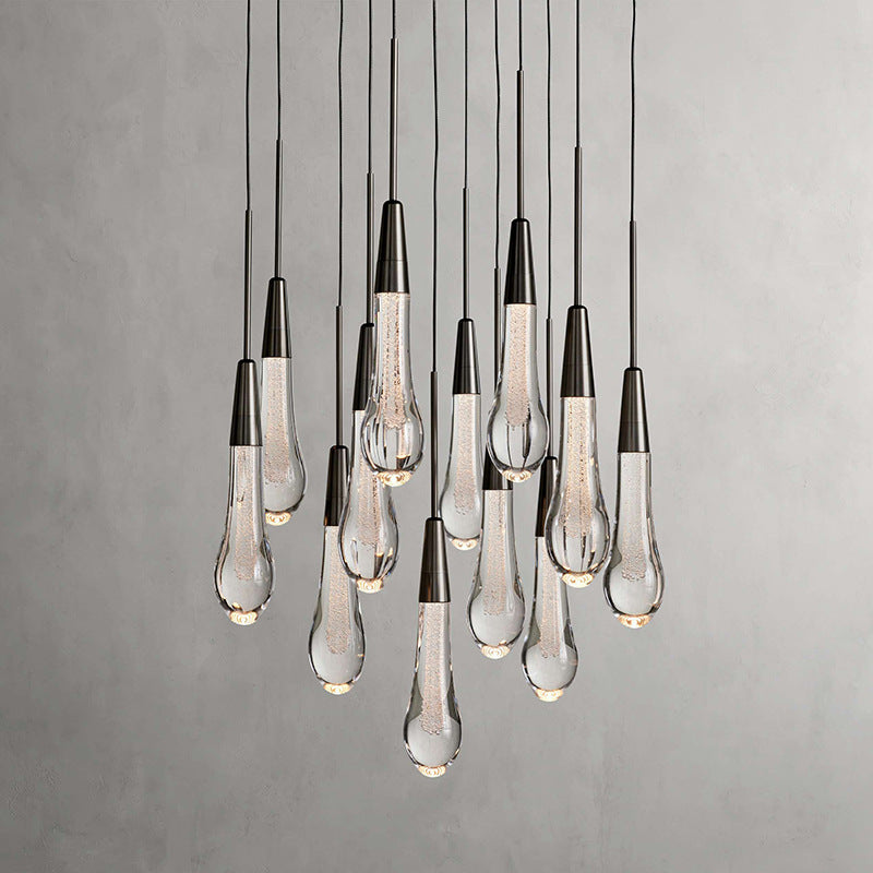 North America Arhaus Villa: Open-concept duplex staircase with long, understated luxury crystal living room lights and copper pendant lights