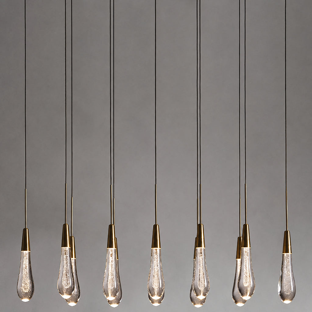 North America Arhaus Villa: Open-concept duplex staircase with long, understated luxury crystal living room lights and copper pendant lights