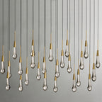 North America Arhaus Villa: Open-concept duplex staircase with long, understated luxury crystal living room lights and copper pendant lights