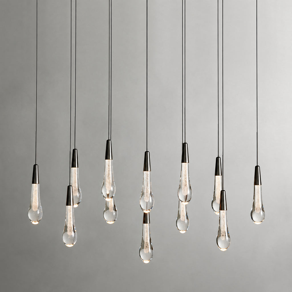 North America Arhaus Villa: Open-concept duplex staircase with long, understated luxury crystal living room lights and copper pendant lights