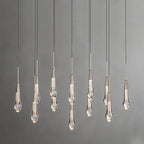 North America Arhaus Villa: Open-concept duplex staircase with long, understated luxury crystal living room lights and copper pendant lights