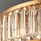 Chandelier for double‑height space, minimalist style for living and dining rooms, atmospheric artistic golden twisted‑leaf glass