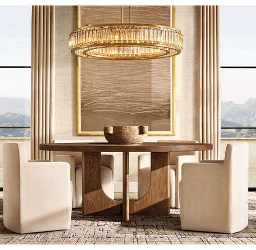Chandelier for double‑height space, minimalist style for living and dining rooms, atmospheric artistic golden twisted‑leaf glass