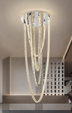 Large pendant lighting fixture for living room in a duplex home; open-plan pendant lighting fixture with crystal necklace design for villa-style buildings with mezzanine floors – modern light luxury style
