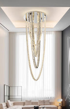 Large pendant lighting fixture for living room in a duplex home; open-plan pendant lighting fixture with crystal necklace design for villa-style buildings with mezzanine floors – modern light luxury style
